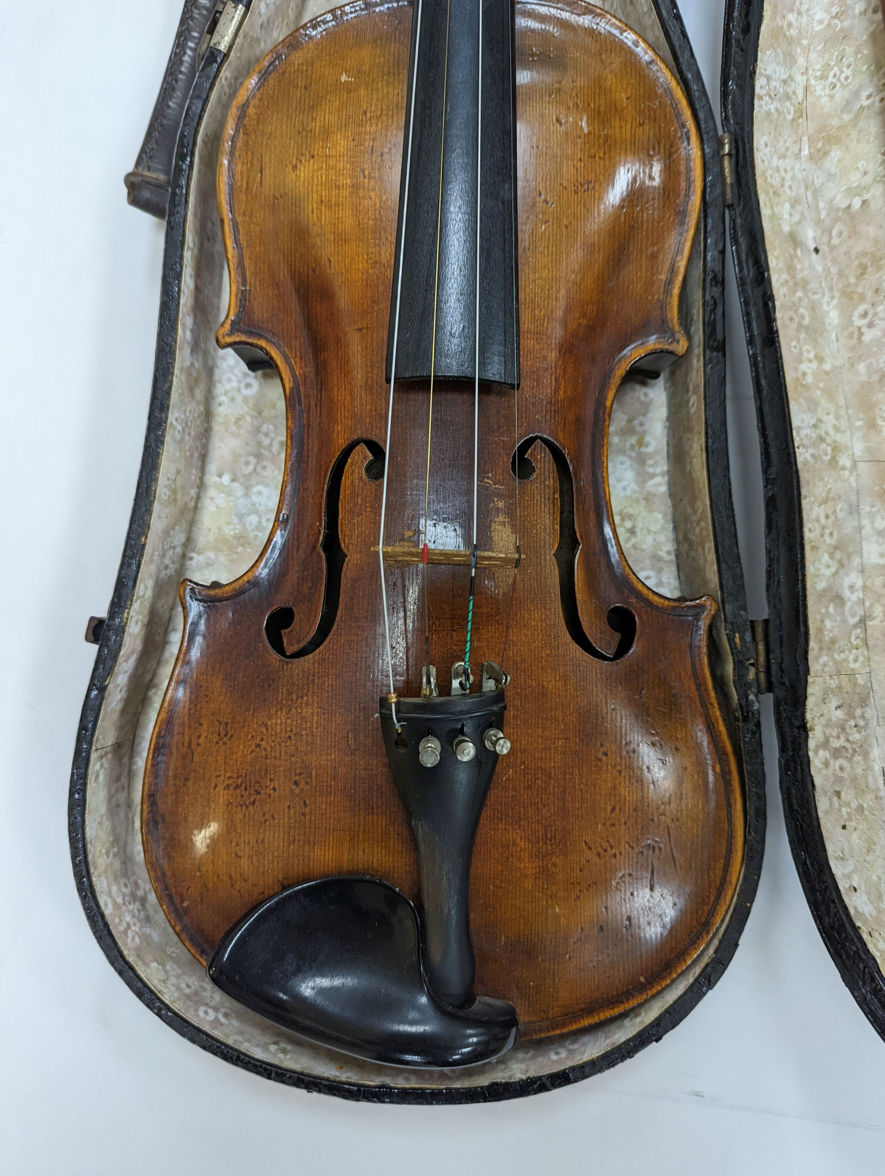 Two cased violins and bows, one with ‘Antonius Straduarius Cremonensis Faciebat Anno 17/13 Made In Czechoslovakia’ label to interior